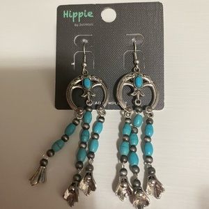 Turquoise on silver either dangles